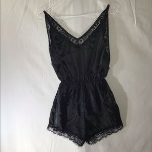 Sexy black lace romper never worn perfect condition.